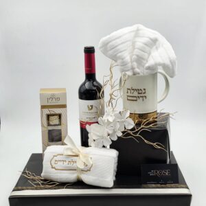 נטלה נירוסטה<br>זוג מגבות עם רקמה<br>יין ויז'ן טפרברג<br>מארז פרלינים מאורך